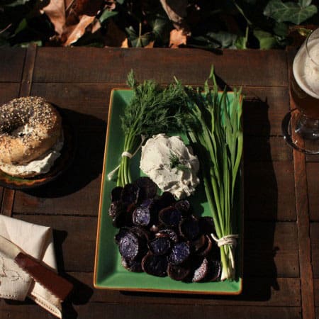 CrumbleBerry-Cashew-Hemp-Garlic-Chive-Dill-Cashew-Cheese-2 CrumbleBerry Hemp Garlic Chive Dill Cashew Cheese plated on a table