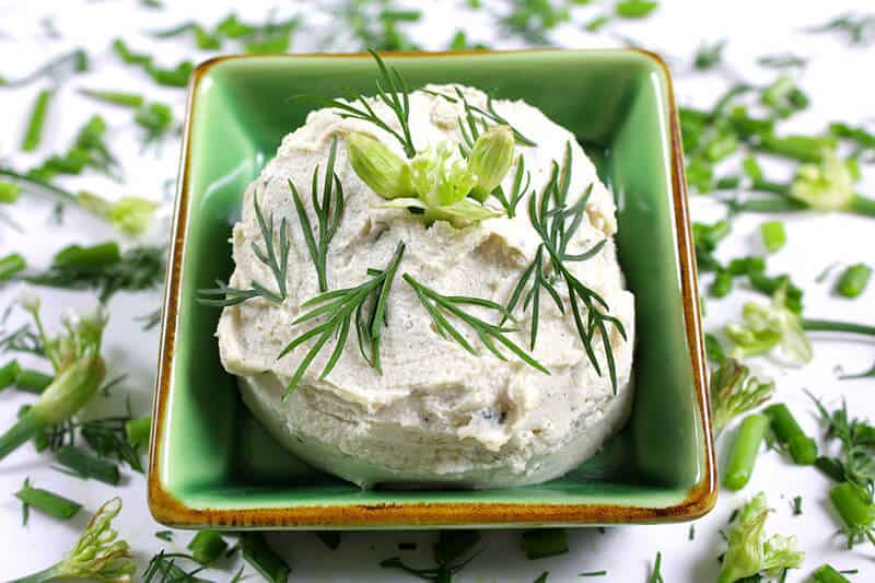 CrumbleBerry-French-Herb-Cashew-Cheese File name: CrumbleBerry French Herb Cashew Cheese in a ceramic dish