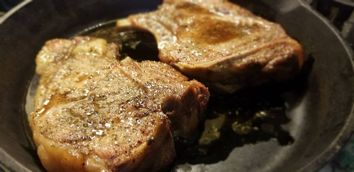 Pork chops in a cast iron pan